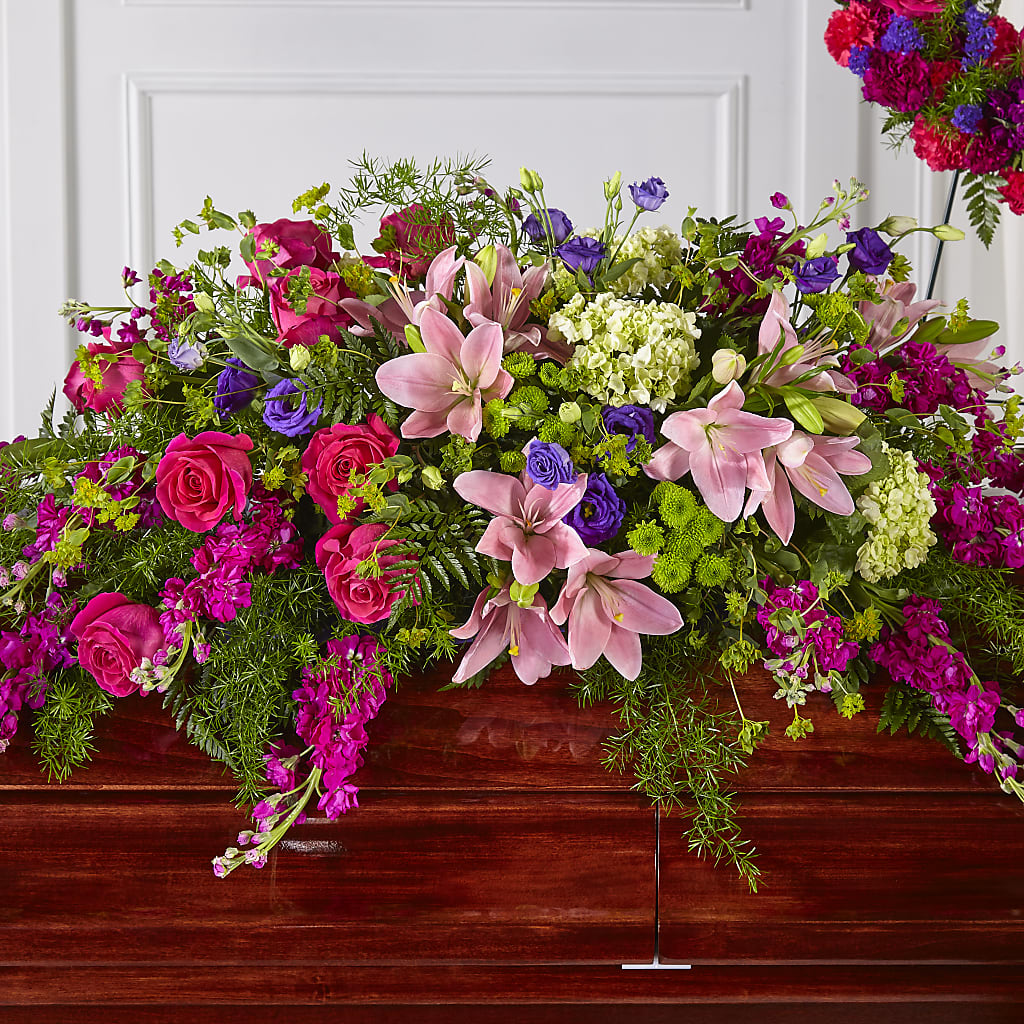 Radiant Tribute Casket Spray – Janette Florists Inc, Windsor ON